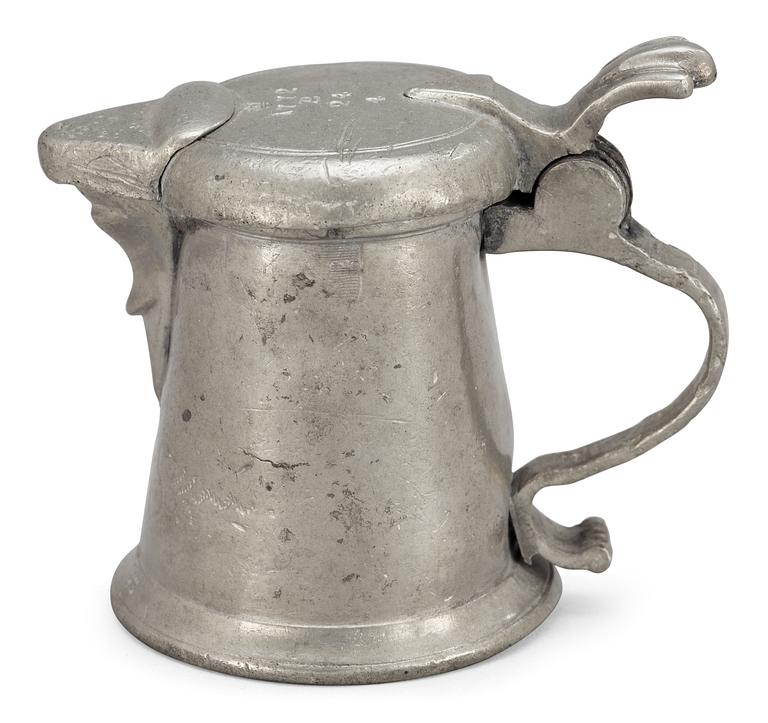 A Swedish pewter measure vessel dated 1772.