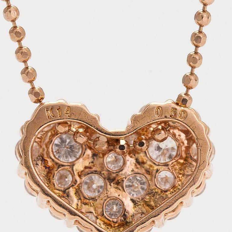 A 14K and 18K rose gold heart pendant necklace with diamonds ca 0.50 ct in total.