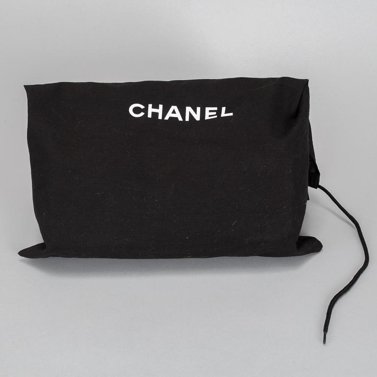 A white Chanel bag, 2010-2011.