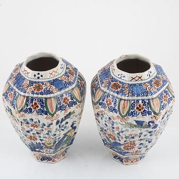 A pair of faience urns with covers, Holland, 19th / 20th Century.