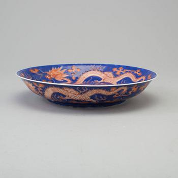 A iron-red and blue porcelain dish, 20th century, with Guangxus six character mark.