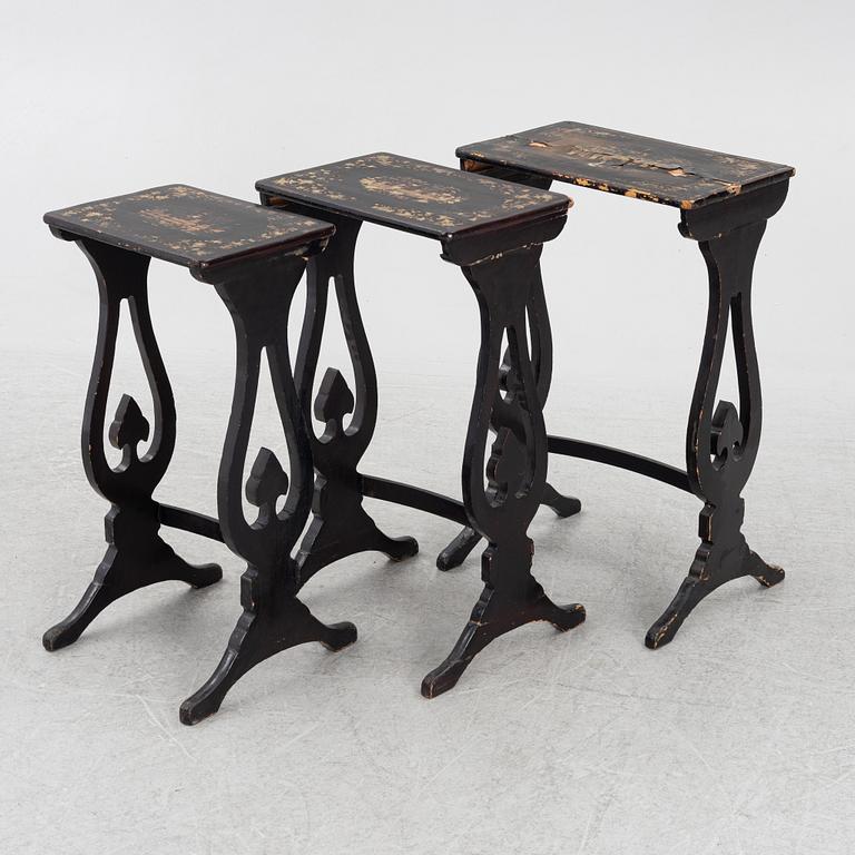 A lacquered nesting table, around 1900.