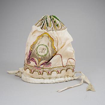 A night cap in silk dated 1801.