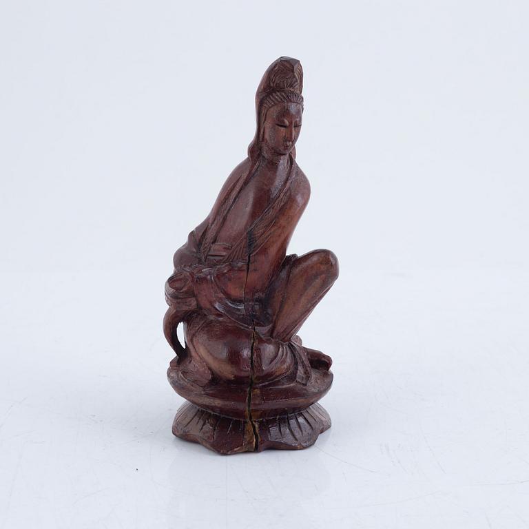 Six Chinese carved wooden figurines, 20th century.