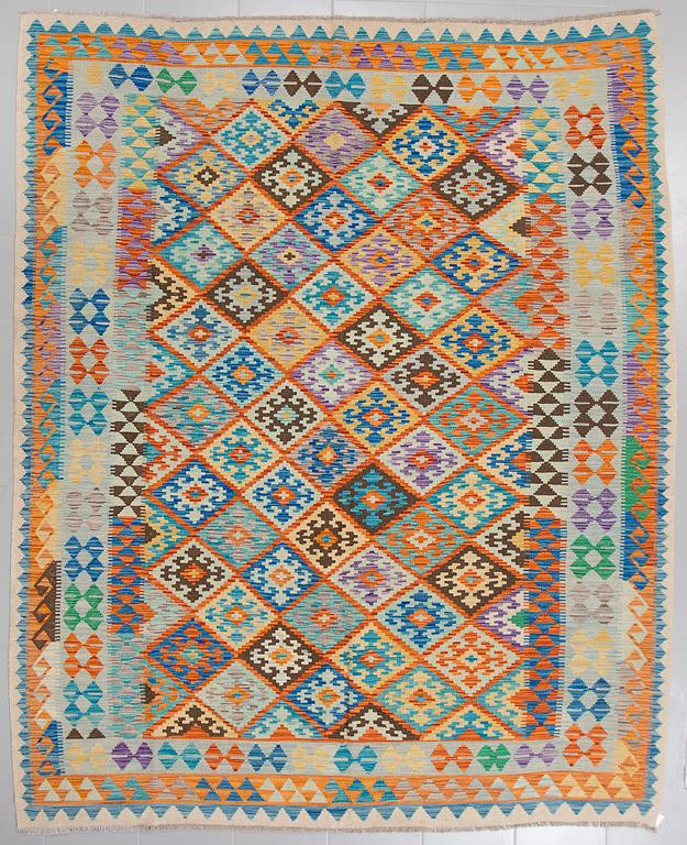 A kilim rug, 298 x 218 cm.