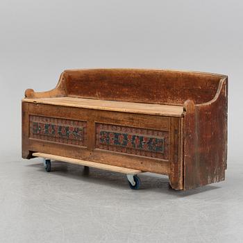 A painted Swedish wooden sofa, dated 1845.