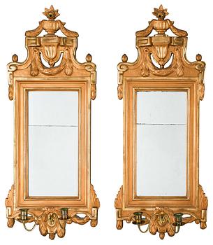 574. A pair of Gustavian two-light girandole mirrors.