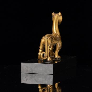 An elegant gilt bronze sculpture of a tiger, Six dynasties, or earlier.