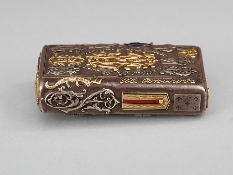 A CIGARRETTE Russian 19th century parcel gilt and enameld cigarette-case, makers mark of Michael Isakov, S.t Petersburg.