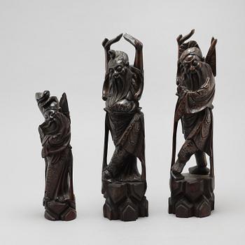 Three chinese wooden sculptures, 20th century.