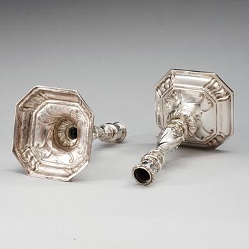 A pair of German 18th century silver candlesticks, makers mark of Johan Friedrich Tihm d.ä., Stettin (1728-1785).