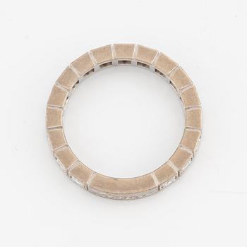An 18K white gold Cartier ring set with round brilliant-cut diamonds.