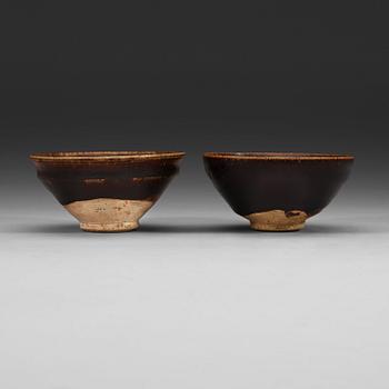 253. A set of two odd temmoku jianyao bowls, Song dynasty (960-1279).