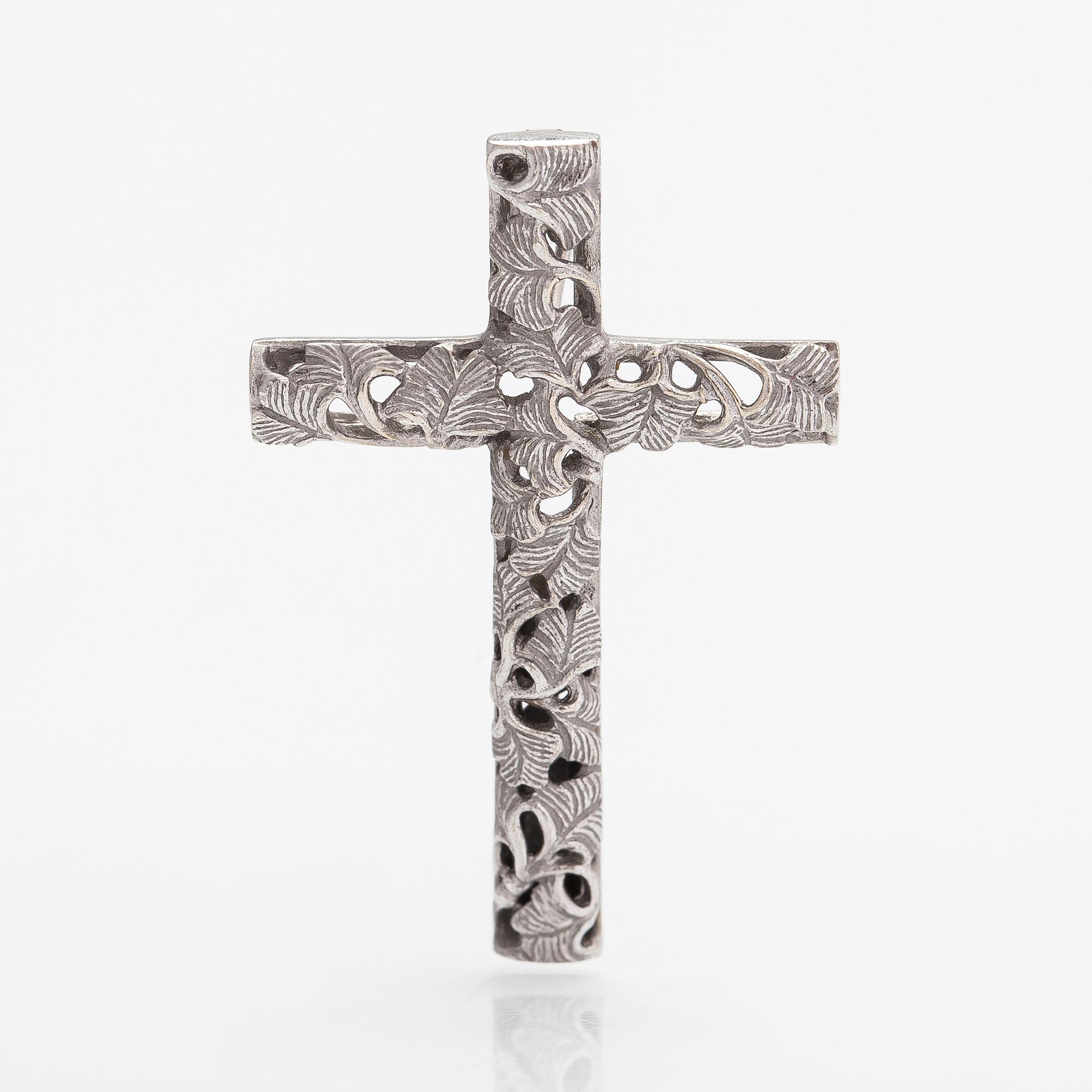 A Carrera y Carrera cross pendant in 18K whitegold.
