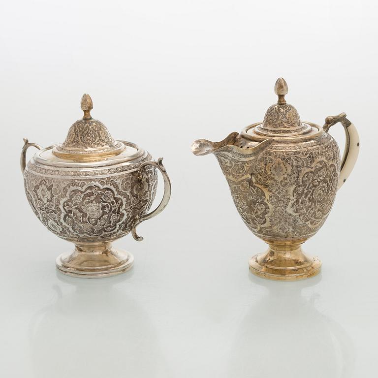 A 5-piece Persian tea service, first half of the 20th century.