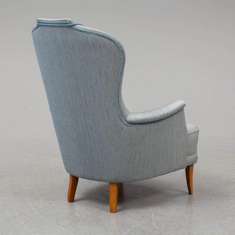 A second half of the 20th Century armchair by Carl Malmsten.