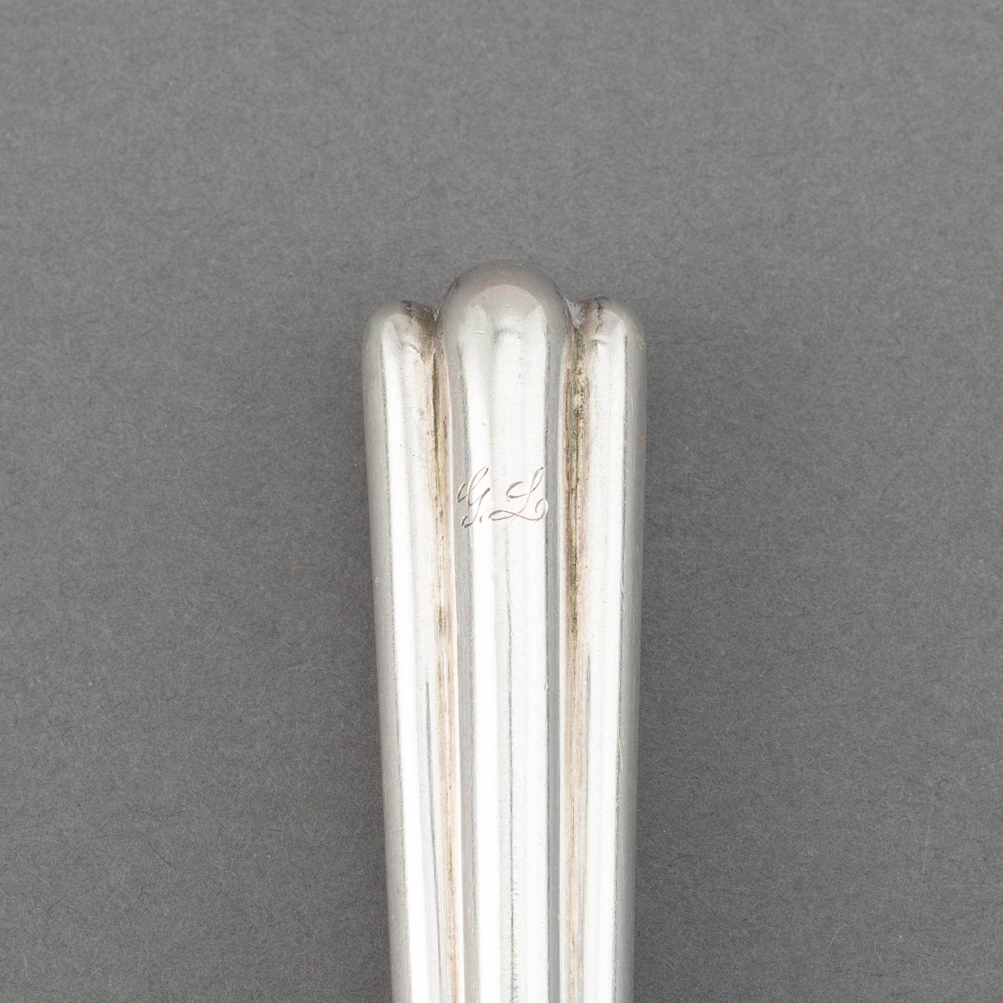 A set of twelve Swedish 19th century silver dinner-knifes, mark of Adolf Lilja, Stockholm 1859.