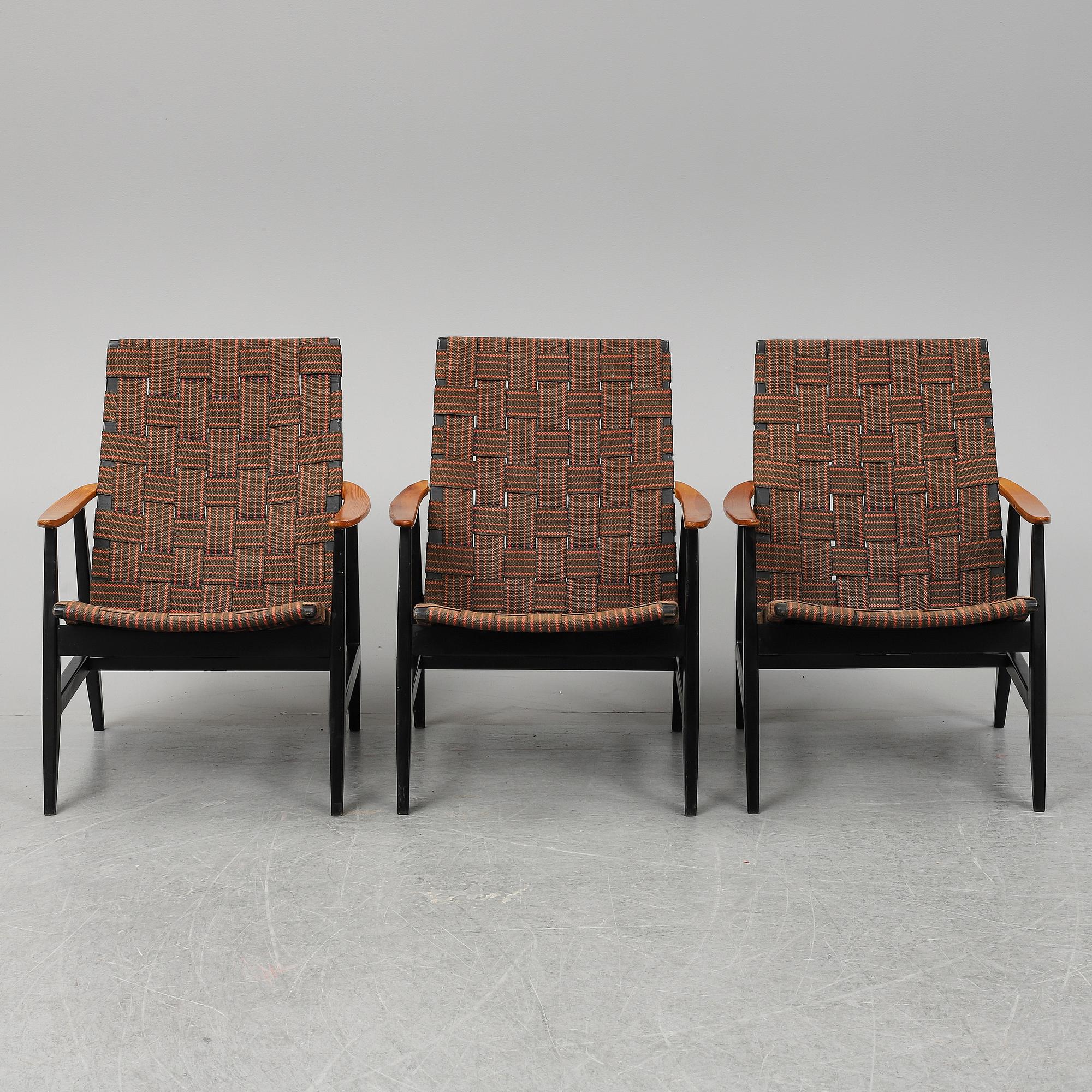 A set of three 1950's easy chairs.