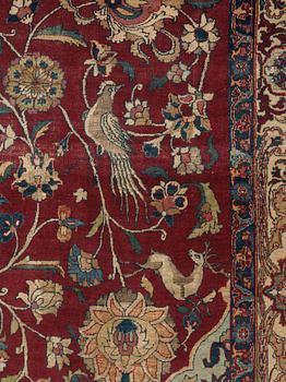 A CARPET, A semi-antique Esfahan part silk, ca 350,5 x 233,5 cm.