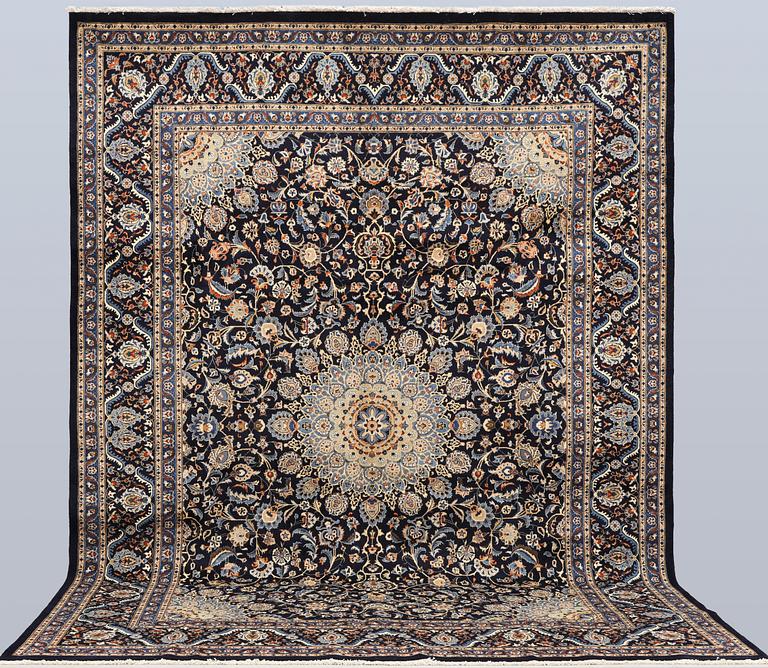 A Keshan carpet, approx. 400 x 295 cm.
