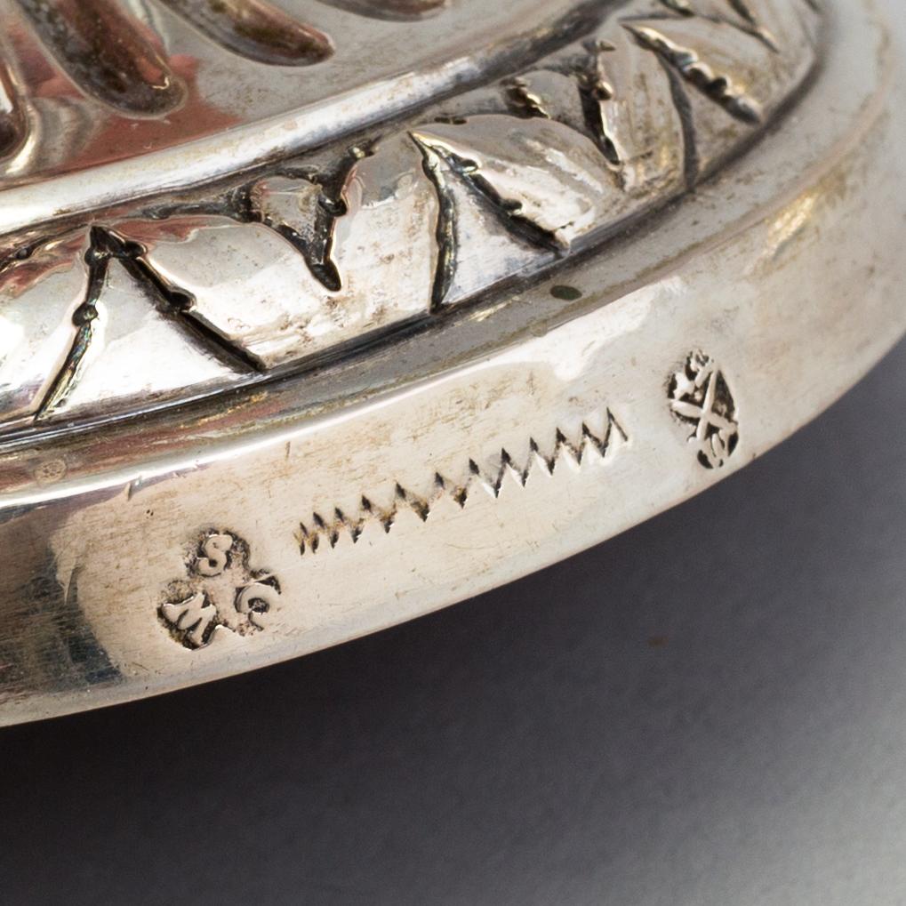 A pair of late 18th century silver candlesticks with unclear hallmarks, possibly from Germany. Weight ca 316 grams.