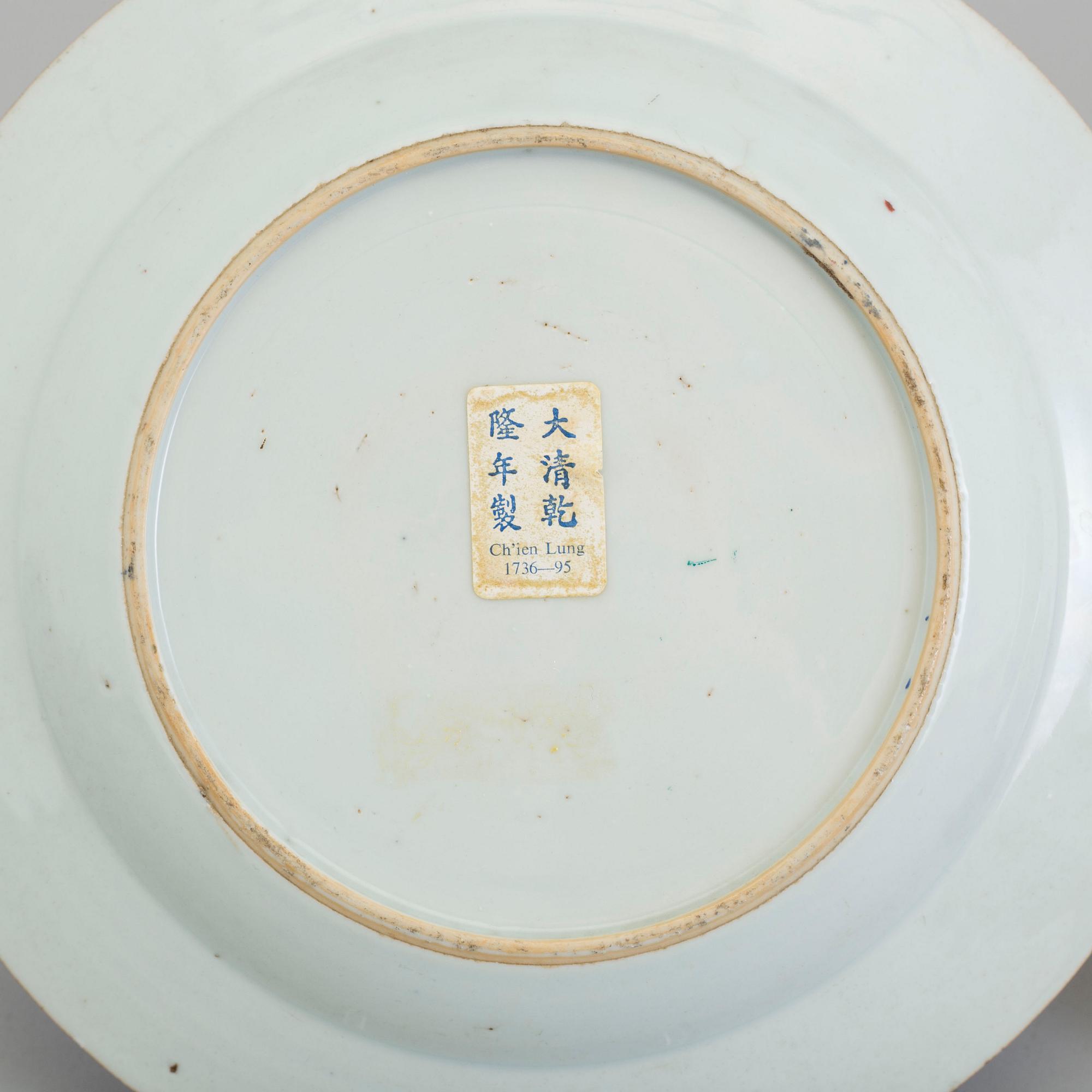 Three famille rose export porcelain plates, Qing dynasty, early 18th century.