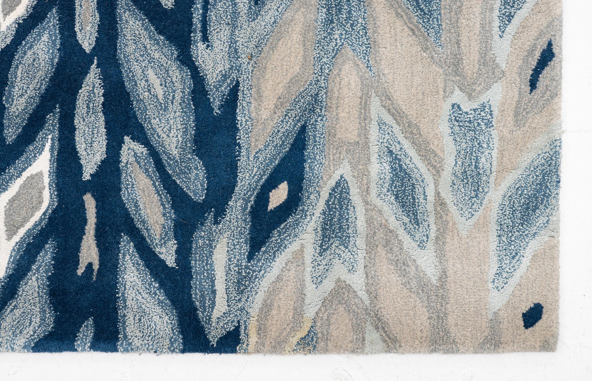 William Yeoward, a 'Kalata Indigo' carpet, circa 425 x 300 cm.