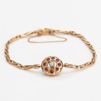 Armband, 14K guld, rubiner, diamant ca 0.11 ct.