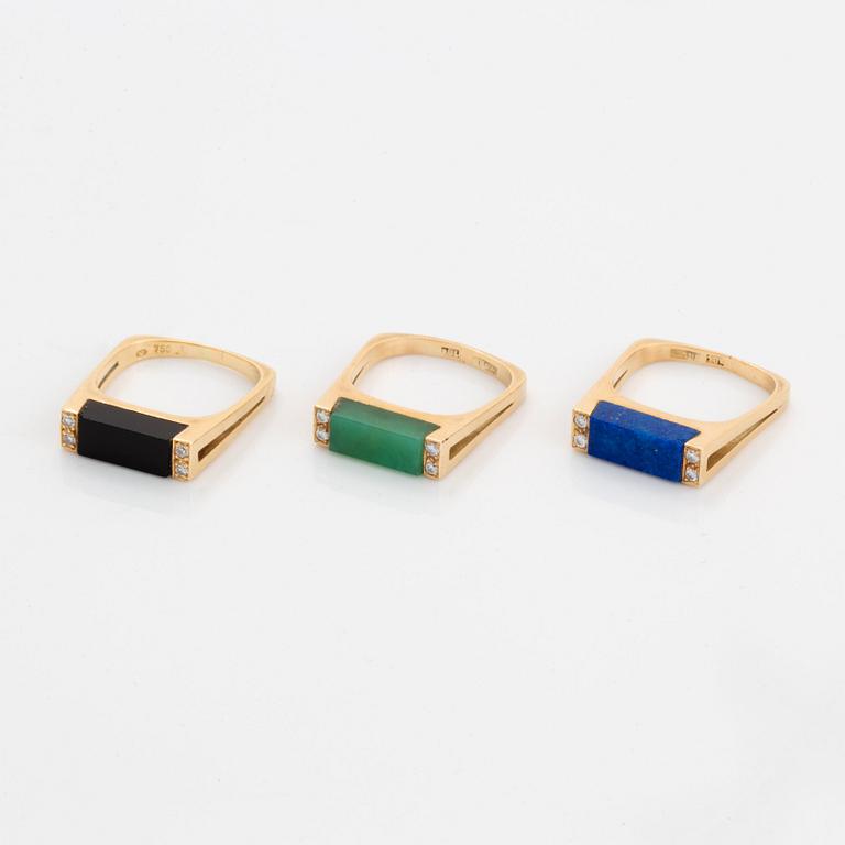 Three rings in 18K gold set with lapis lazuli, onyx and green quartz.