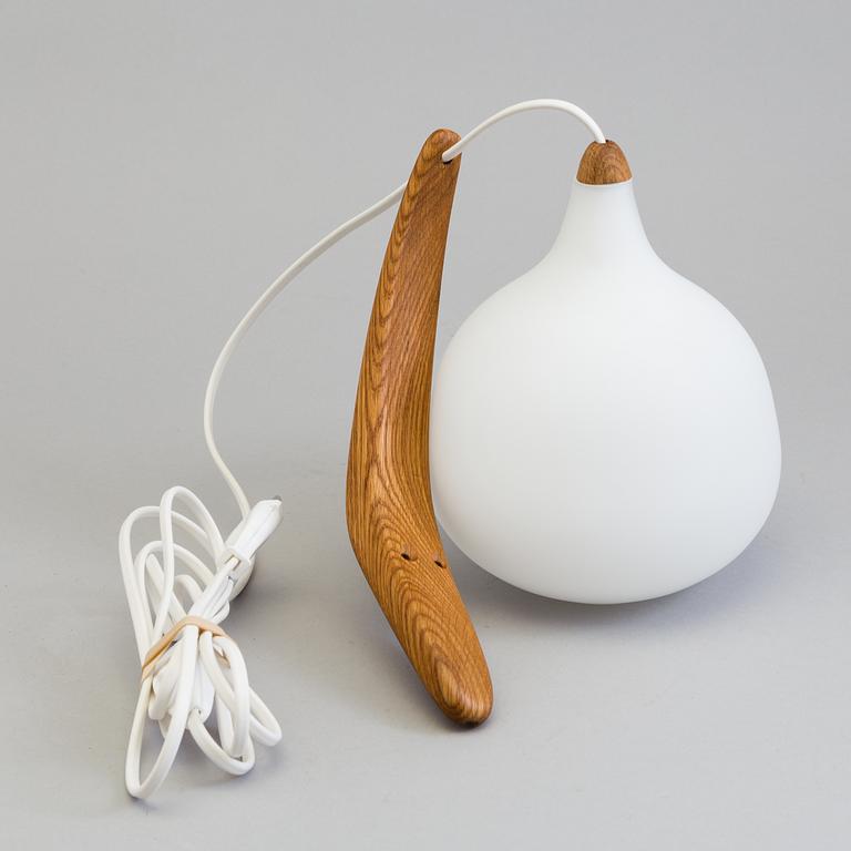 A Uno and Östen Kristiansson oak and glass wall lights from Luxus.