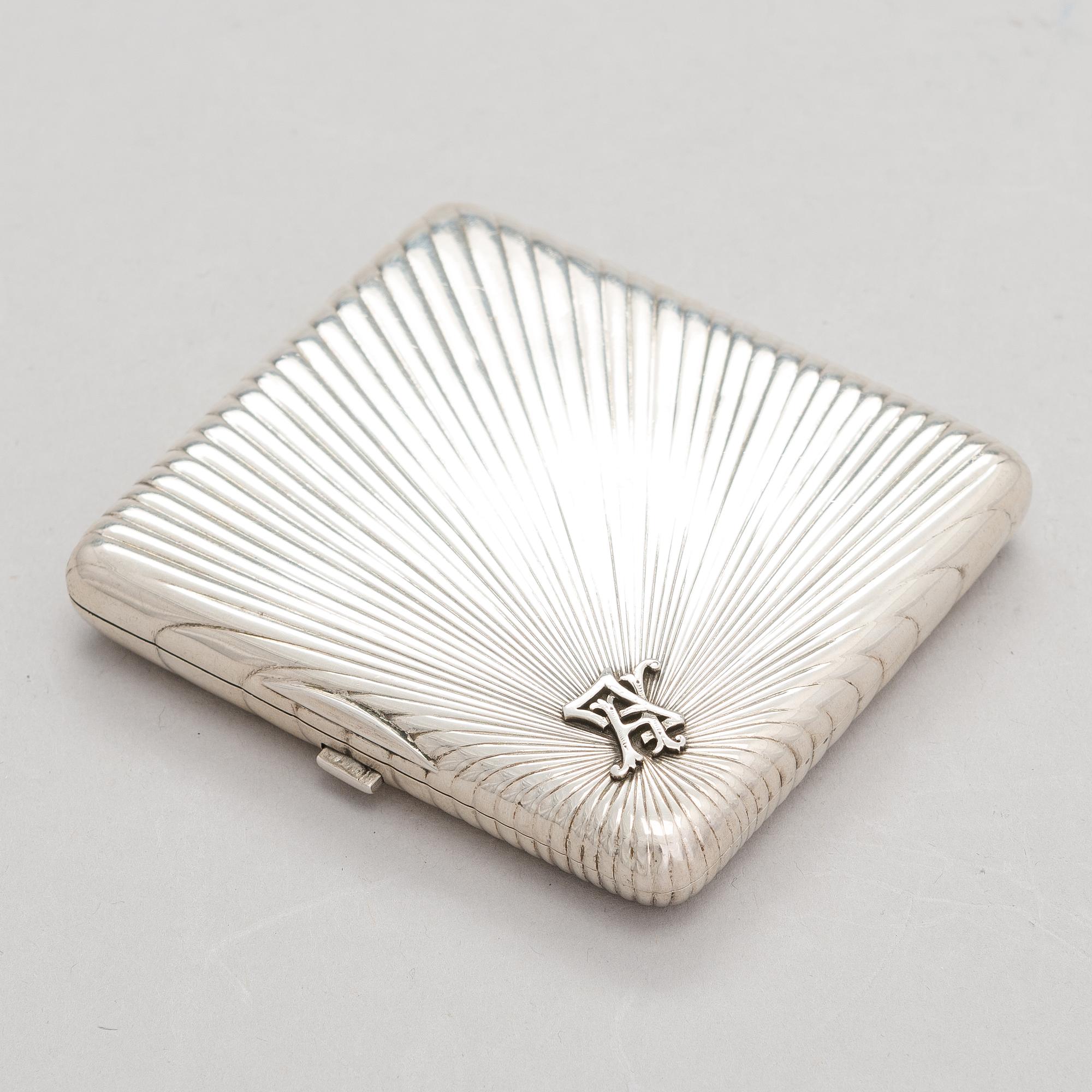 A silver cigarette case, maker's mark of Johan Allenius, Saint Petersburg, Russia 1898.