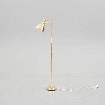 A brass standard light from the mid 20th century.