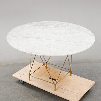 A 'Spider' dining table by Andreas Hansen for Eilersen.