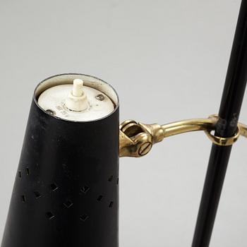 A Swedish Modern brass and black lacquered floor lamp, 1950's.
