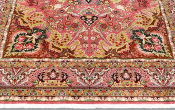 A Tabriz carpet, part silk, 50 Raj count, c. 290 x 200 cm.