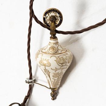 A glass and creamware lamp, possibly France, Art Nouveau.