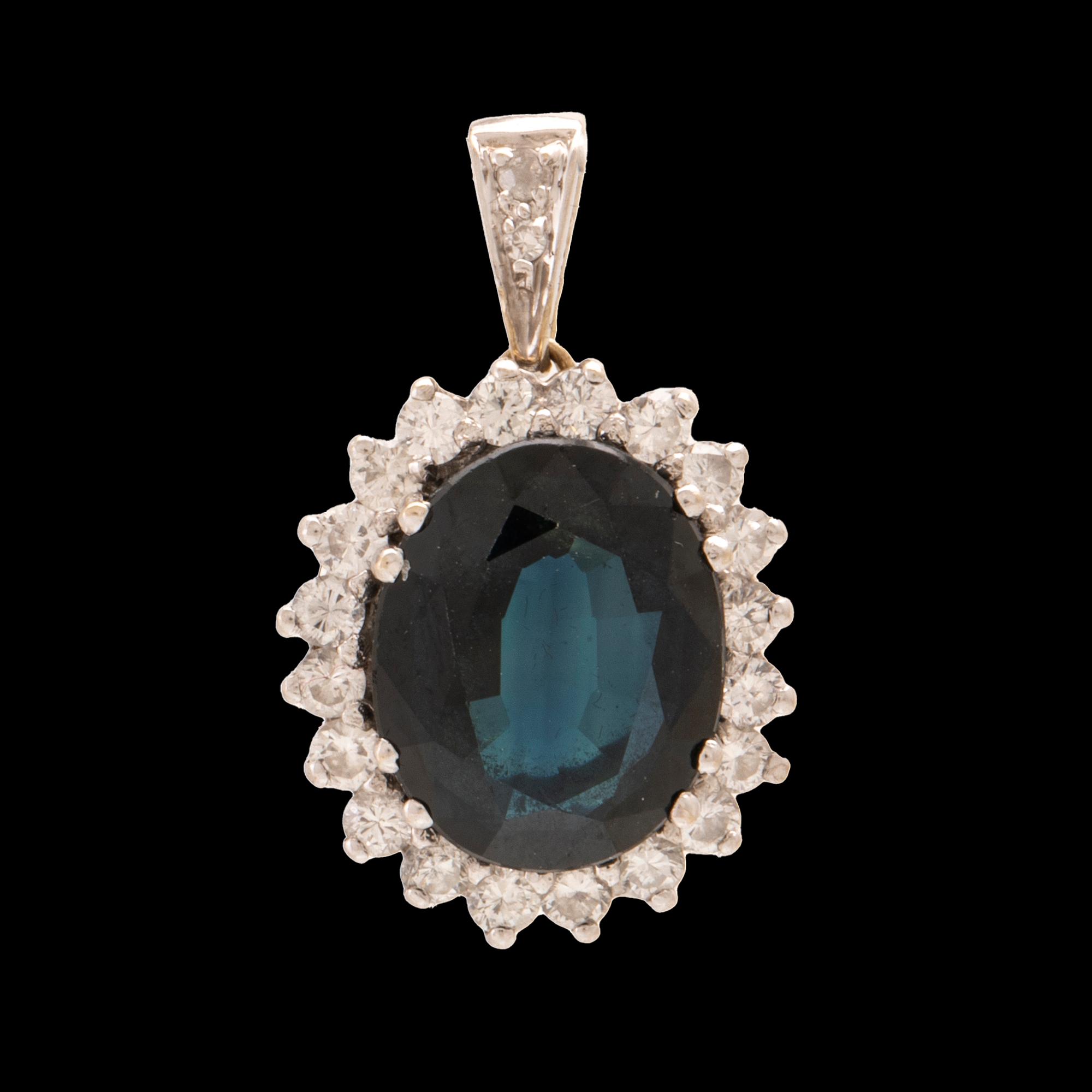Pendant in 18K white gold with an oval faceted sapphire and round brilliant and single-cut diamonds.