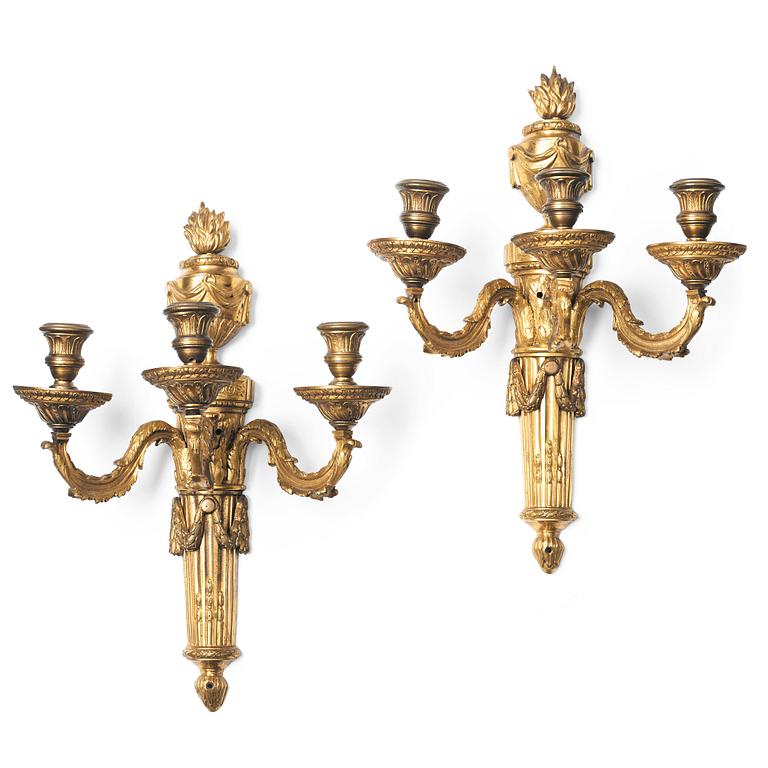 A pair of presumably Gustavian three-light wall-lights, late 18th century.