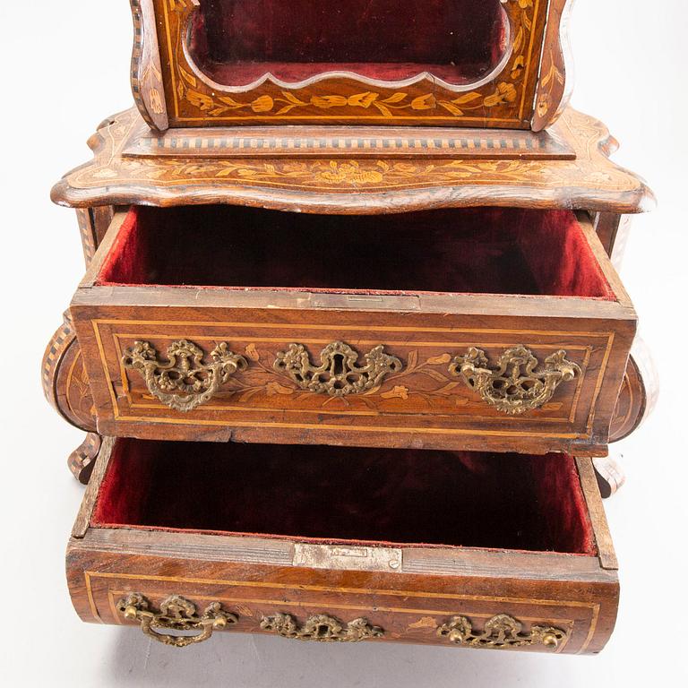 A Louis XV-style miniature cabinet around 1900.