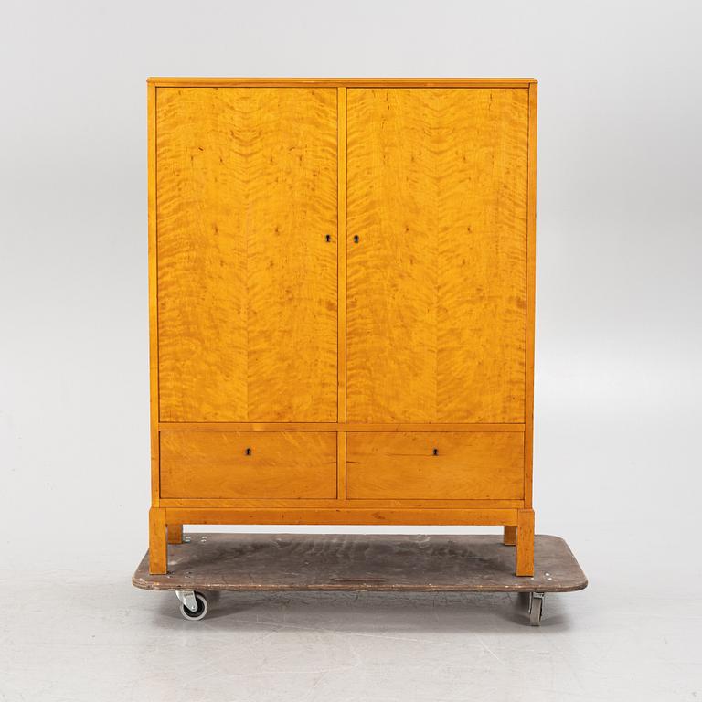 A Swedish birch wood cabinet. 1930s/40s.