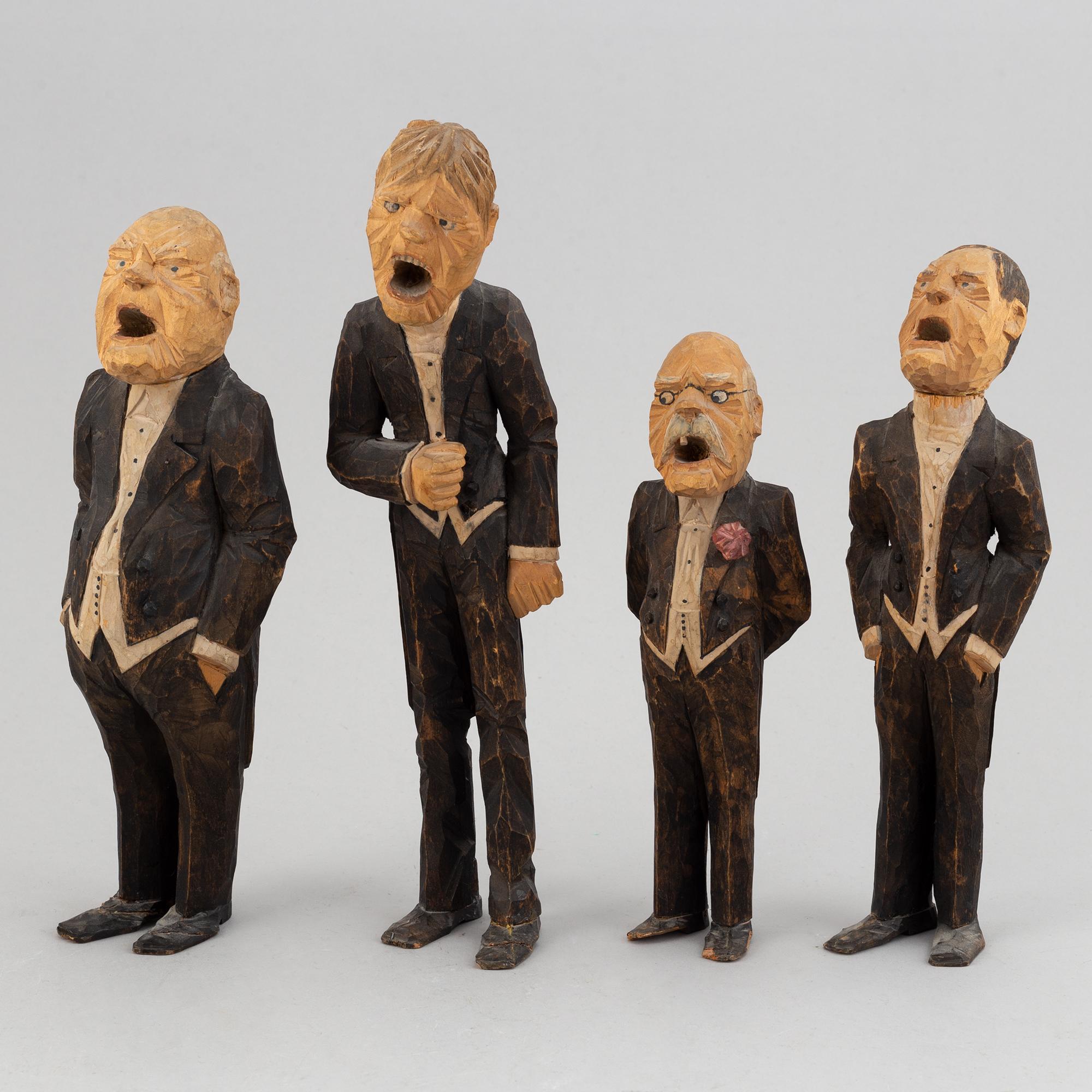 Four wooden sculptures by Axel Ericsson, signed and dated -29.