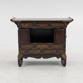 A Chinese hardwood cabinet, early 20th century.