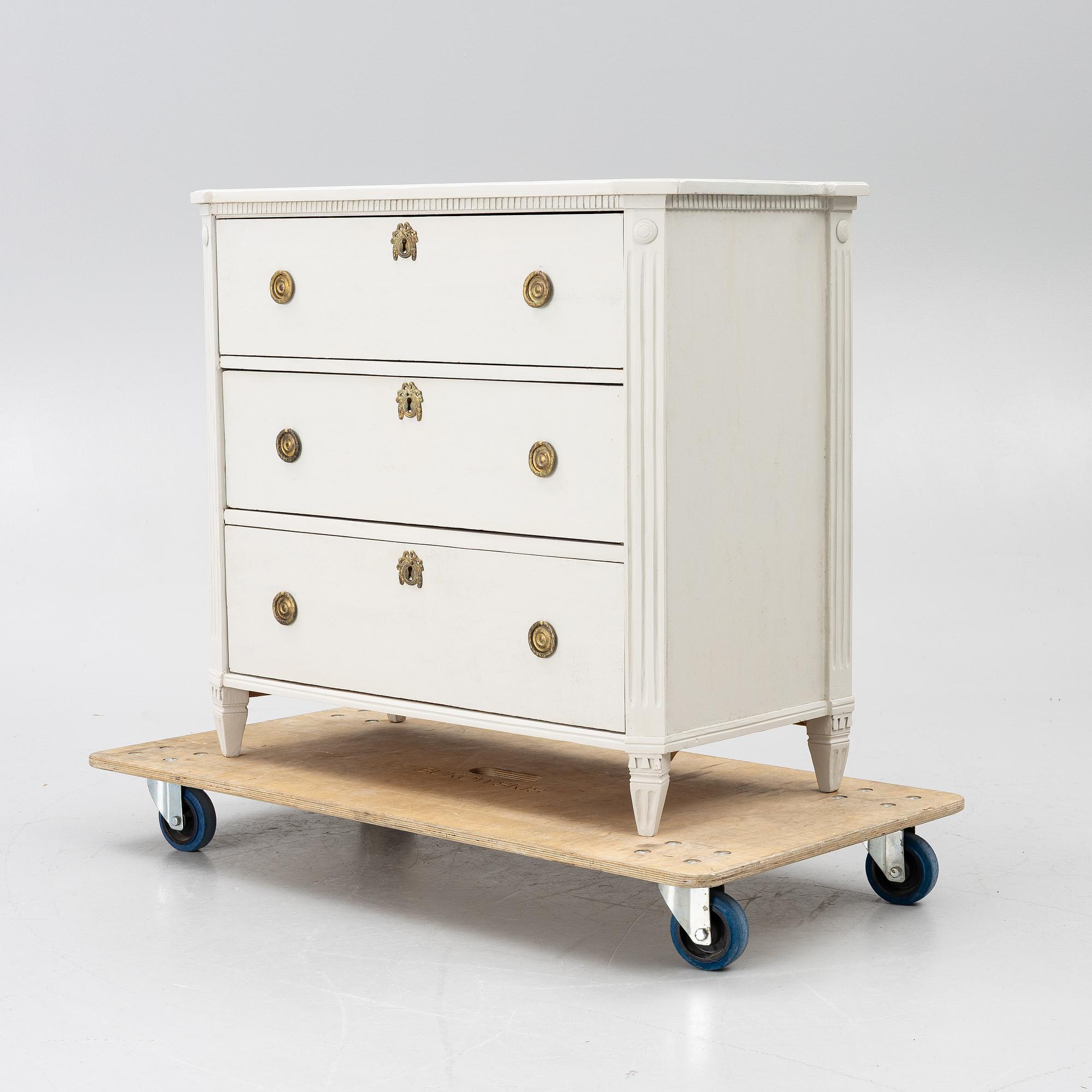 A Gustavian style chest of drawers, 20th century.
