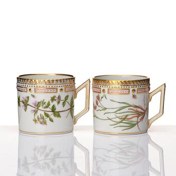 A set of 12 Royal Copenhagen 'Flora Danica' coffee cups with stands, Denmark, 20th Century.