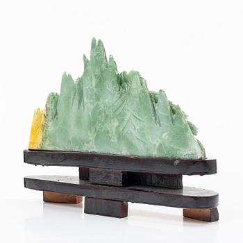 A serpentine jade csulptural carving, China, modern manufacturing.