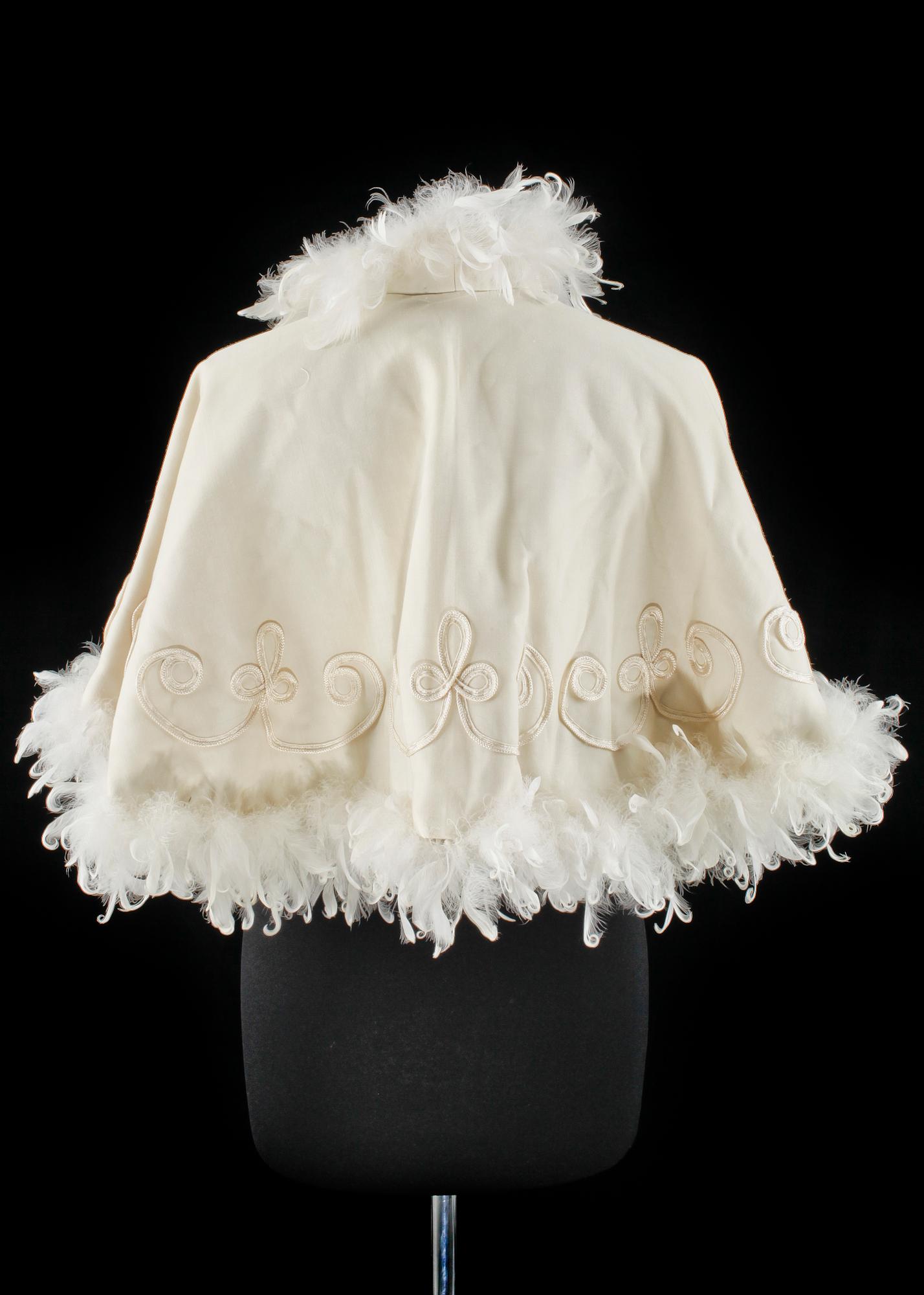 A cream colored silk wedding dress/evening dress by Mea.