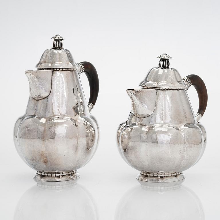 Albert Feinauer, a six-piece silver coffee and tea service with tray, Weimar-Schmuck, Germany 1921-1925.