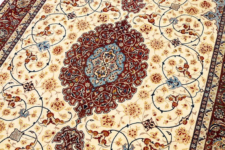 An Isfahan carpet, Central Persia, signed Akbaroff, c. 315 x 205 cm.