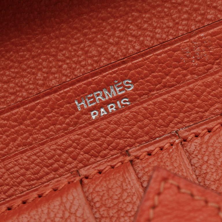 A wallet by Hermès.