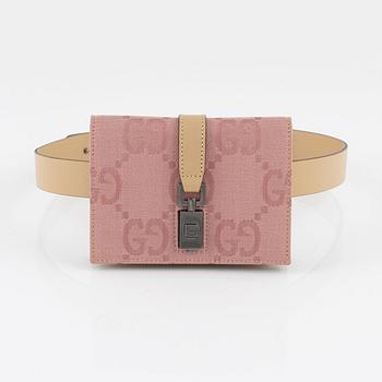 Gucci, a belt with a bag.